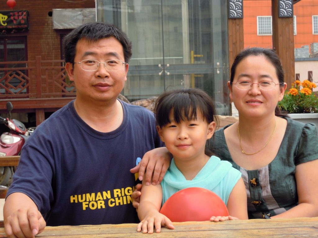 Lawyer Jiang Tianyong with wife and daughter