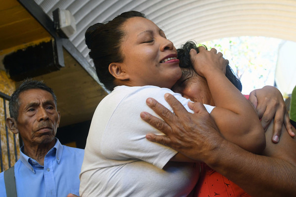 Teodora hugs her mother after her release. Photo: AFP/Getty Images