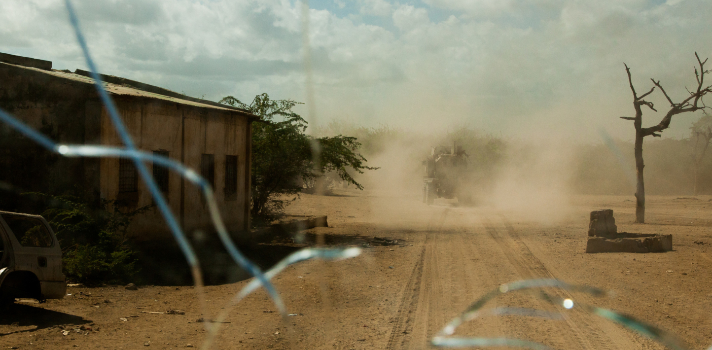 The streets are seen through the windshield of an armored personnel carrier (APC) during a routine AMISOM patrol in the recently reclaimed town of Qoryooley, Lower Shabelle, Somalia, April 29, 2014.