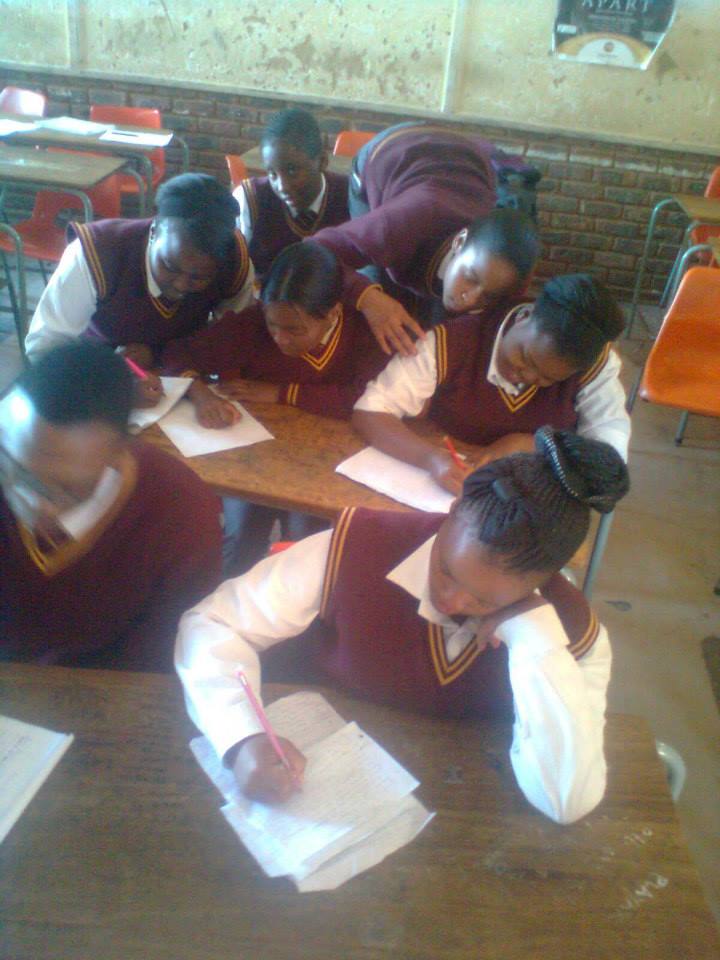 Learners write letters for the Letter Writing Marathon at Mosuptasela High School, South Africa. ©Amnesty International
