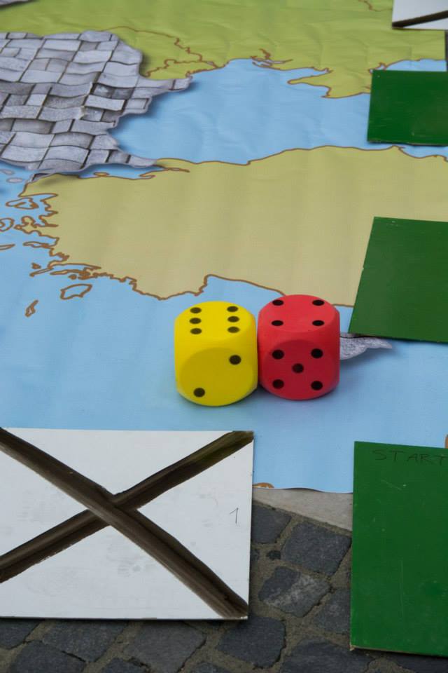 The dice that will reveal the scenarios to the players, Prešeren Square, Ljubljana, Slovenia, 17 June 2015, © Amnesty International Slovenia (Bojan Stepančič)