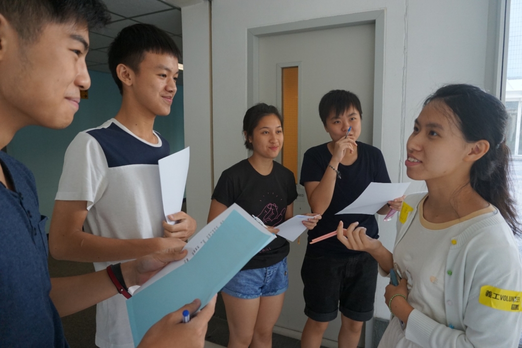 Students participated in a role-play scenario, where, as media reporters, they were responsible for interviewing an Indonesian migrant domestic worker on her living conditions and views on labour policies. Hong Kong, China, July 2016 © Amnesty International Hong Kong