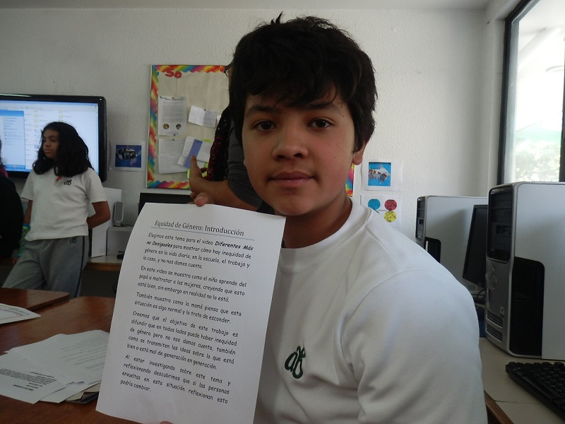 Student Santiago Villalobos shows the text he wrote for his video presentation on the Short Film Festival of Gender Equality, which took place on Colegio Alexander Bain’s primary school, 16 May 2014. ©Amnesty International Mexico.