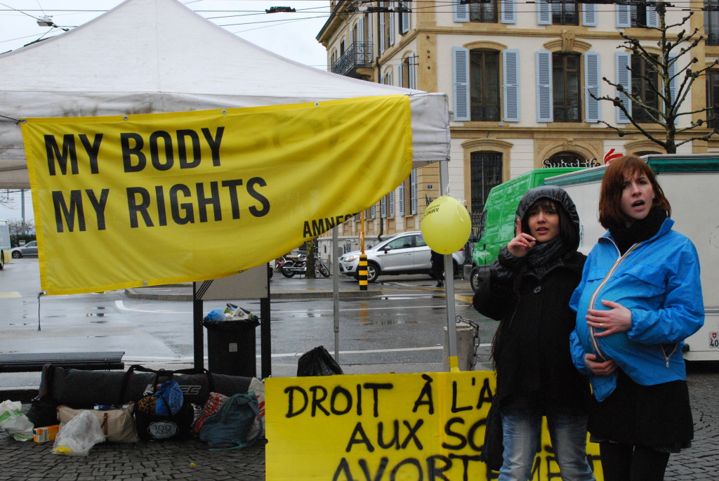 Amnesty youth group members in Switzerland role-play on the right to sexual health during their Youth Day of Action in Neuchâtel, 2014. © Amnesty International.
