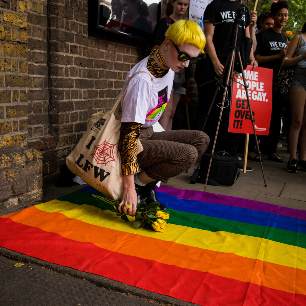 In London, activists from Amnesty International and Stonewall UK laid rainbow roses on a rainbow flag outside the Russian Embassy