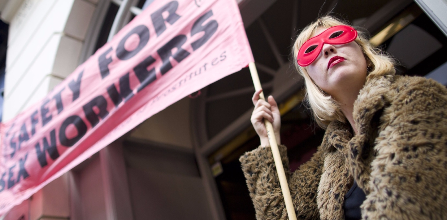 Sex workers and their supporters participate in a demonstration in the Soho district of London on October 9, 2013.
