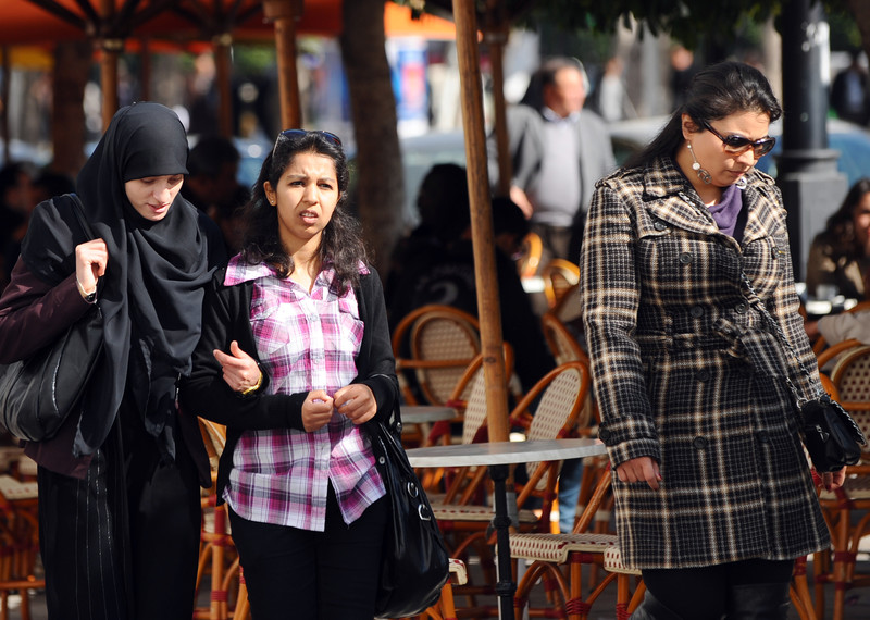 Tunisian women walk in Habib Bourguiba Avenue in Tunis, February 2012. © FETHI BELAID/AFP/Getty Images