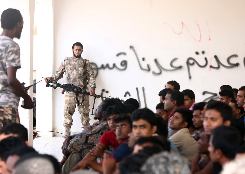 Refugees and migrants intercepted by the Libyan coastguard while attempting to cross the Mediterranean Sea are routinely returned to immigration detention centres in Libya. © MAHMUD TURKIA/AFP/Getty Images