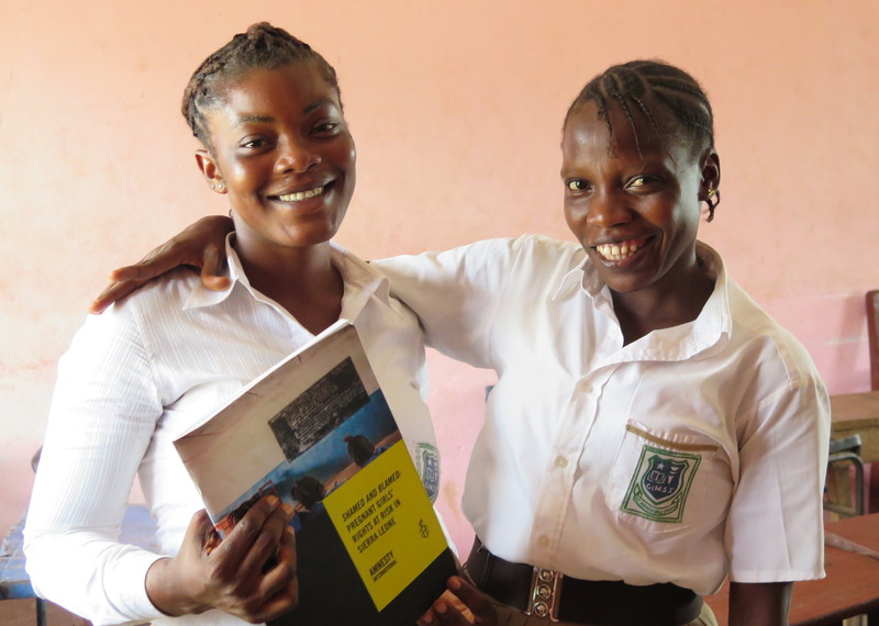 Schoolgirls celebrate as Sierra Leone lifts the ban on pregnant girls accessing education. Credit: Amnesty International.