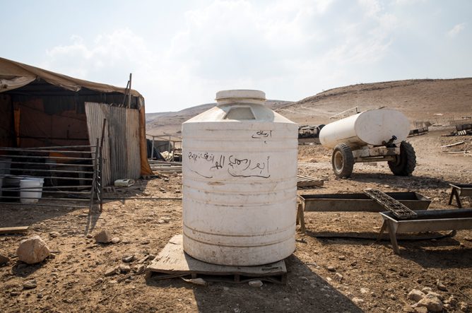 Since Israeli authorities do not recognise the right of many Palestinian communities to live in Area C and refuse to allow them the necessary infrastructure, these families have no access to running water even though a Mekorot pipeline runs along the side of the highway less than 100 meters from their land. To get water they must go twice a day to the local water filling point run by the Mekorot company. © Amnesty International