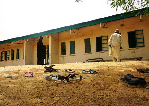 Sandals are strewn in the yard of the Government Girls Science and Technical College staff quarters in Dapchi, Nigeria, on February 22, 2018. Anger erupted in a town in remote Northeast Nigeria on 22 February after officials fumbled to account for scores of schoolgirls who locals say have been kidnapped by Boko Haram. Police said on 21 February that 111 girls from the college were unaccounted for following a Boko Haram raid late on 19 February.
/ AFP PHOTO / AMINU ABUBAKAR (Photo credit should read AMINU ABUBAKAR/AFP via Getty Images)