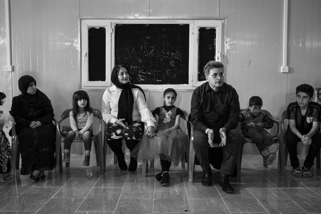 A group of Yezidi child survivors meet with Dr Jan Ilhan Kizilhan, a psychotherapist and Dean of the Institute for Psychotherapy and Psychotraumatology at the University of Dohuk. Photo: Adam Ferguson