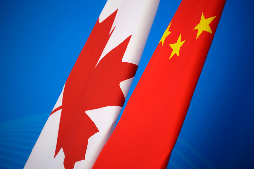 Chinese and Canadian national flags.