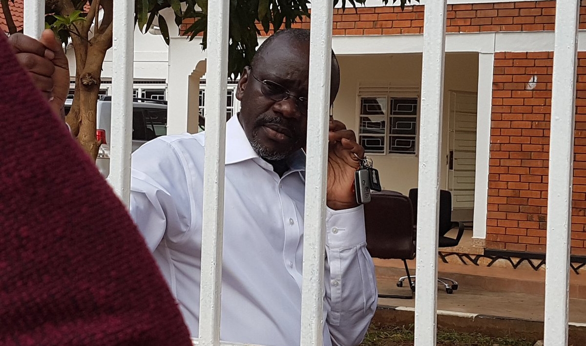 The photo shows Godber Tumushabe, the Executive Director of GLISS, a Uganda NGO, when he was detained in his office compound by police on 21 September 2017.