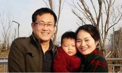 Chinese human rights lawyer Wang Quanzhang, with his wife Li Wenzu and their son.