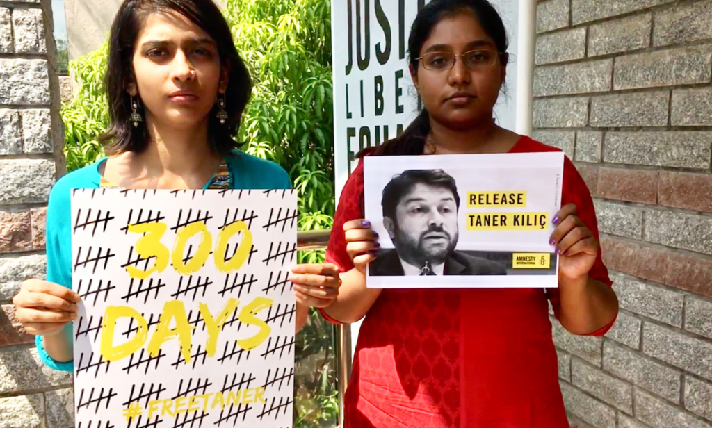 Activists in India demand the release of Taner.