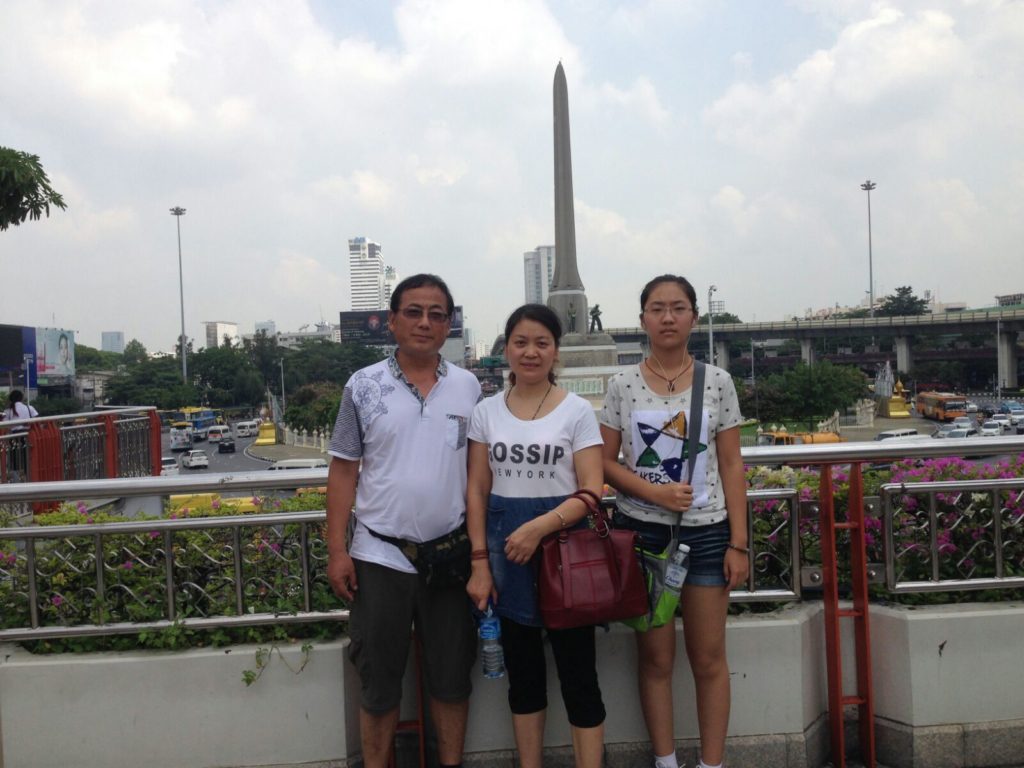 Dong Guangping and his family in Thailand. Credit: Private