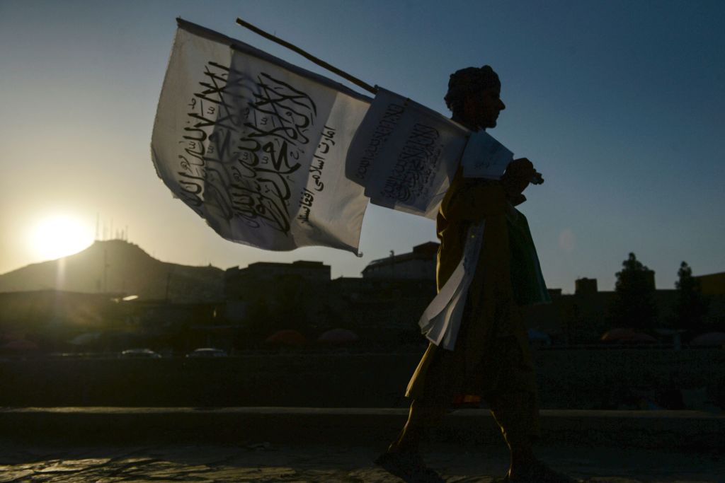 A man selling Taliban flags