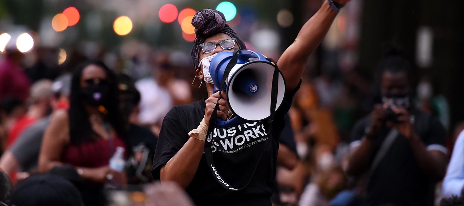 A protestor speaks in front of Lafayette park near the White House