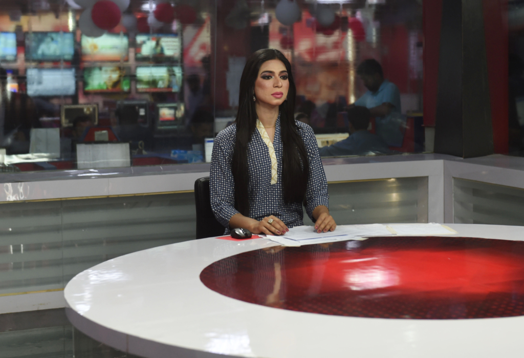 Pakistan's first transgender news anchor Marvia Malik, 21, reads the news on air for the private channel Kohenoor in Lahore (ARIF ALI/AFP/Getty Images)