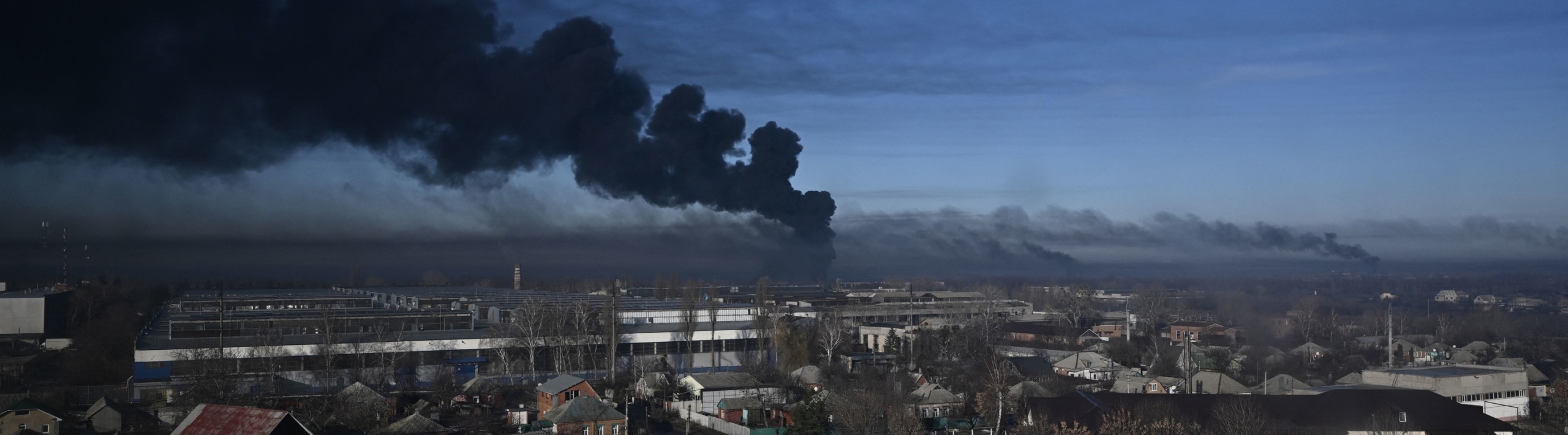 Black smoke rises from a military airport in Chuguyev near Kharkiv, Ukraine, on February 24, 2022.