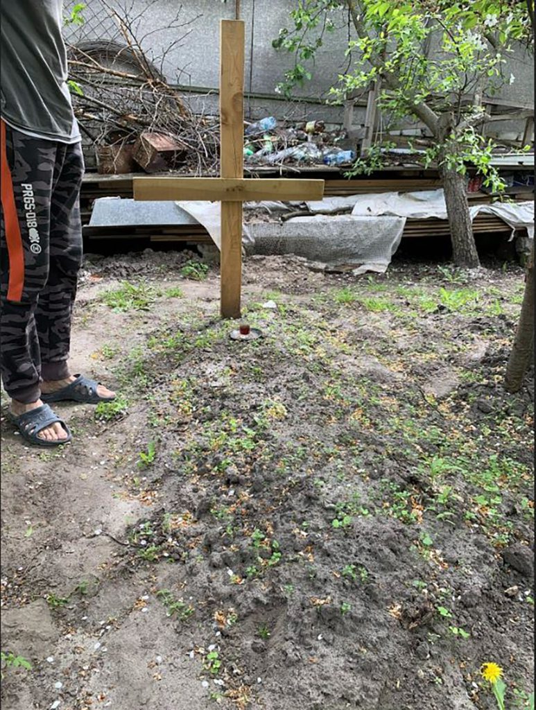 Grave of Konstiantyn “Bars” Melnyk, who was buried by his brother Oleksandr Sydorenko in their garden.