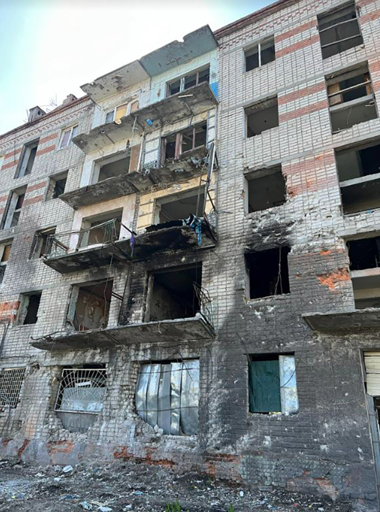 Damage to a building in Nova Bavariya Avenue, where a multi-rocket strike killed at least seven civilians and injured more than 70 on 1 March.