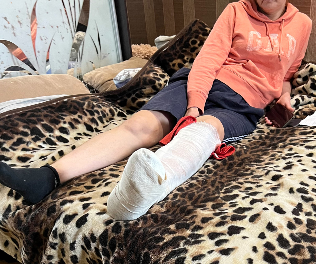 Yevheniia was standing inside the grocery shop where she works in the Saltivka neighbourhood when she was injured by shrapnel from cluster munitions which exploded nearby on 26 April.