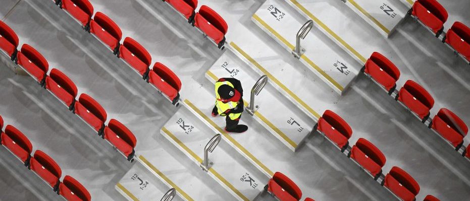 A security guard in a stand at the Qatar World Cup