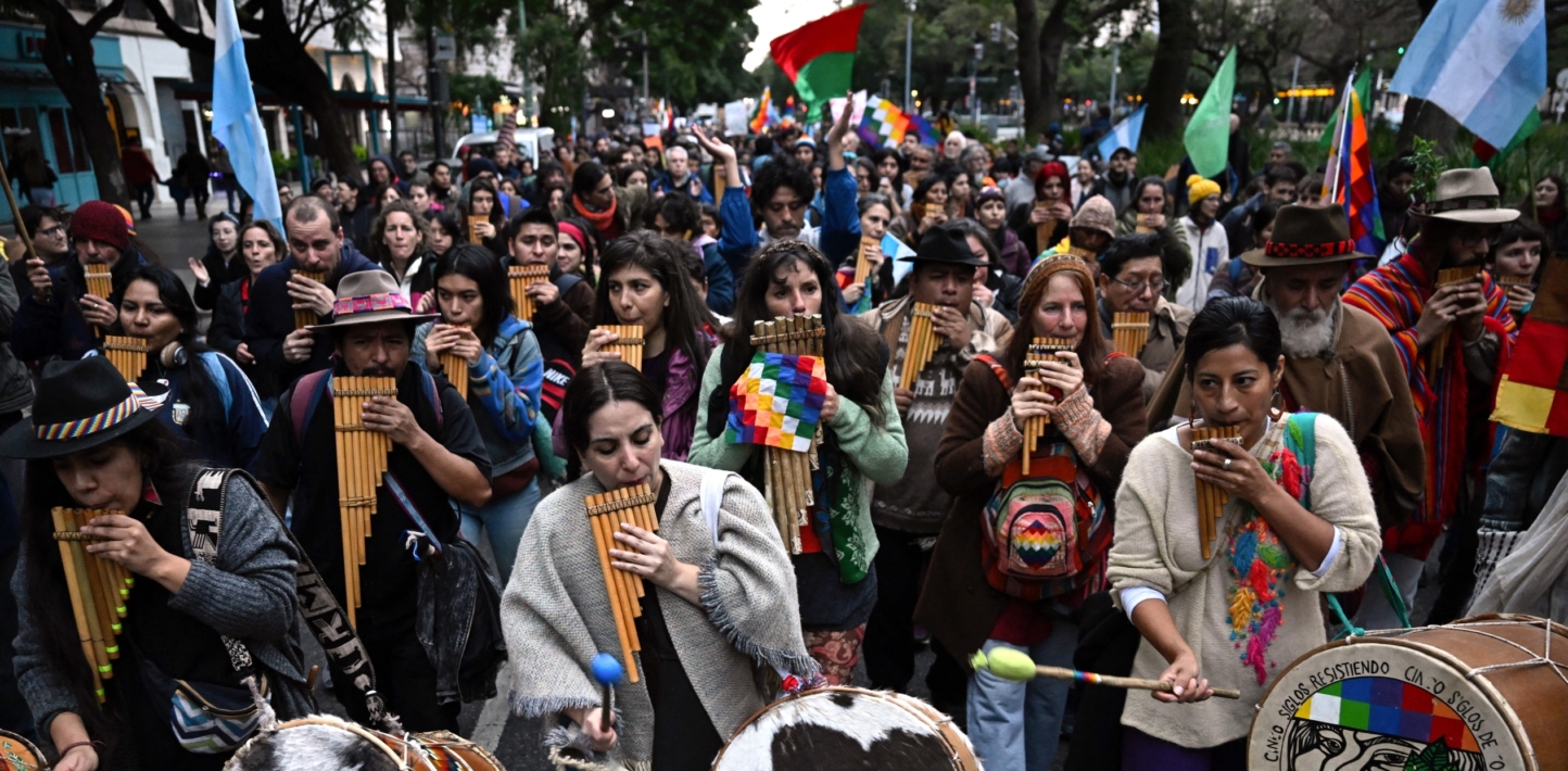 Demonstrators march through Buenos Aires playing panpipes and banging drums, in a protest against Jujuy's Governor Gerardo Morales.