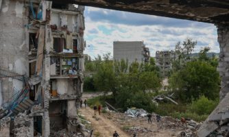 A partially destroyed block in Izyum City in the Kharkiv  region of Ukraine