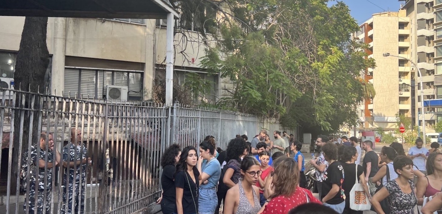 Protesters gather outside the security offices where comedian Nour Hajjar was arrested and questioned last week for comments made in a comedy repertoire that ired Sunni religious clerics In Lebanon.