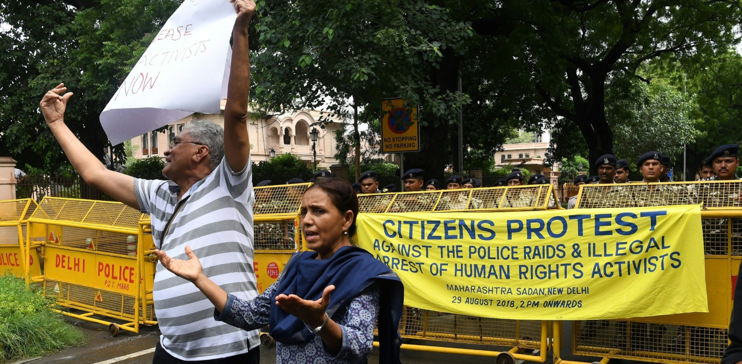 Indian Dalit rights activists, intellectuals and journalists shout slogans against the police raid and illegal arrest of human right activists under the Unlawful Activities Prevention Act (UAPA) during a protest in New Delhi on August 29, 2018.