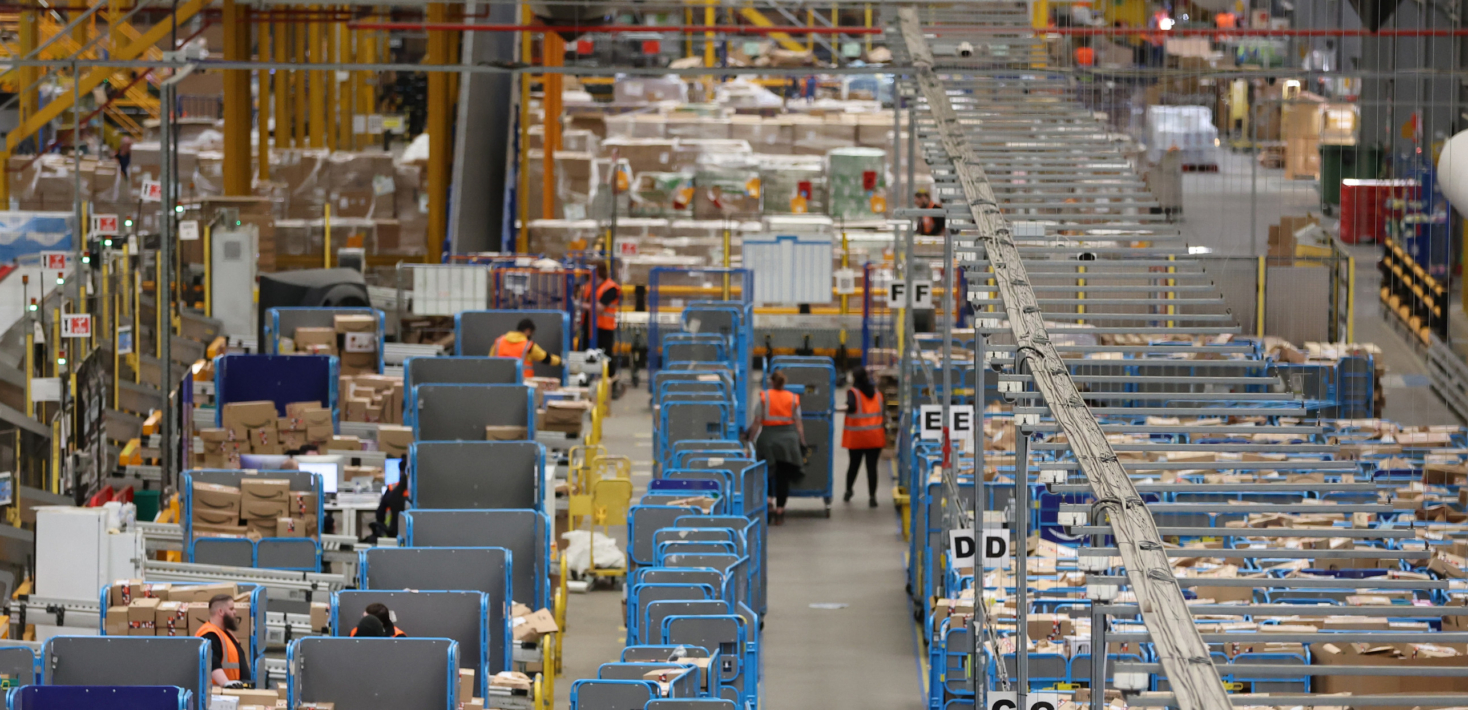 Workers in an Amazon warehouse