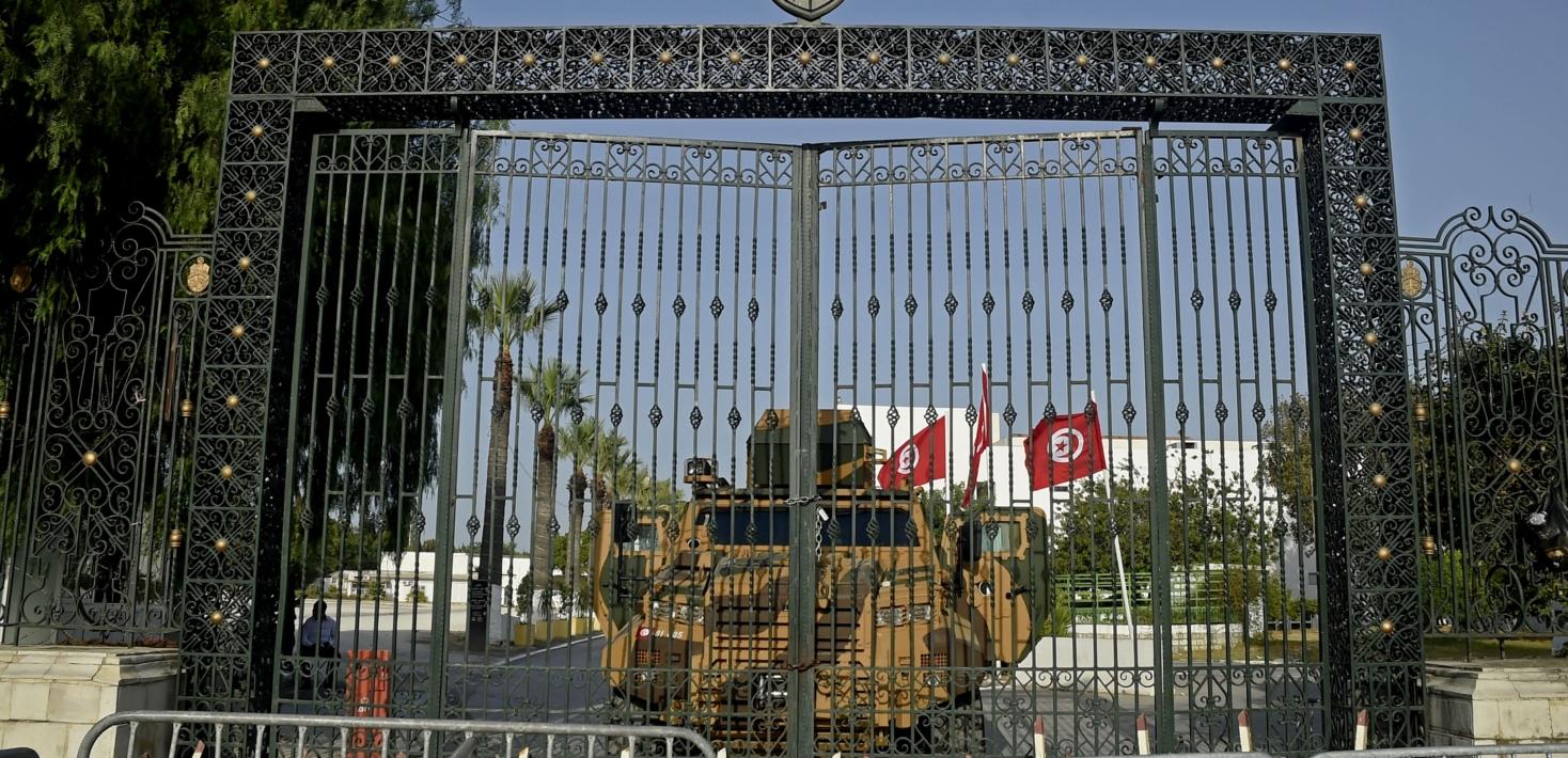 View of the closed metal gates of the entrance to Tunisia parliament in 20221 after the Tunisian army barricaded the parliament building in the capital Tunis on July 26, 2021, after the president dismissed the prime minister and ordered parliament closed for 30 days.
