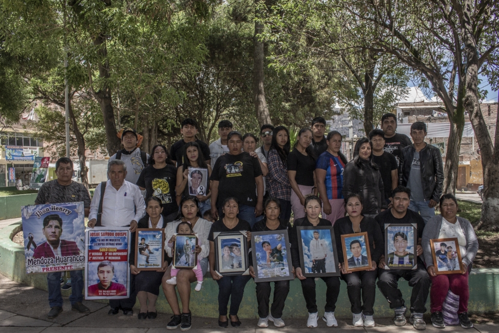 Victims of state repression pose for a photo in Ayacucho