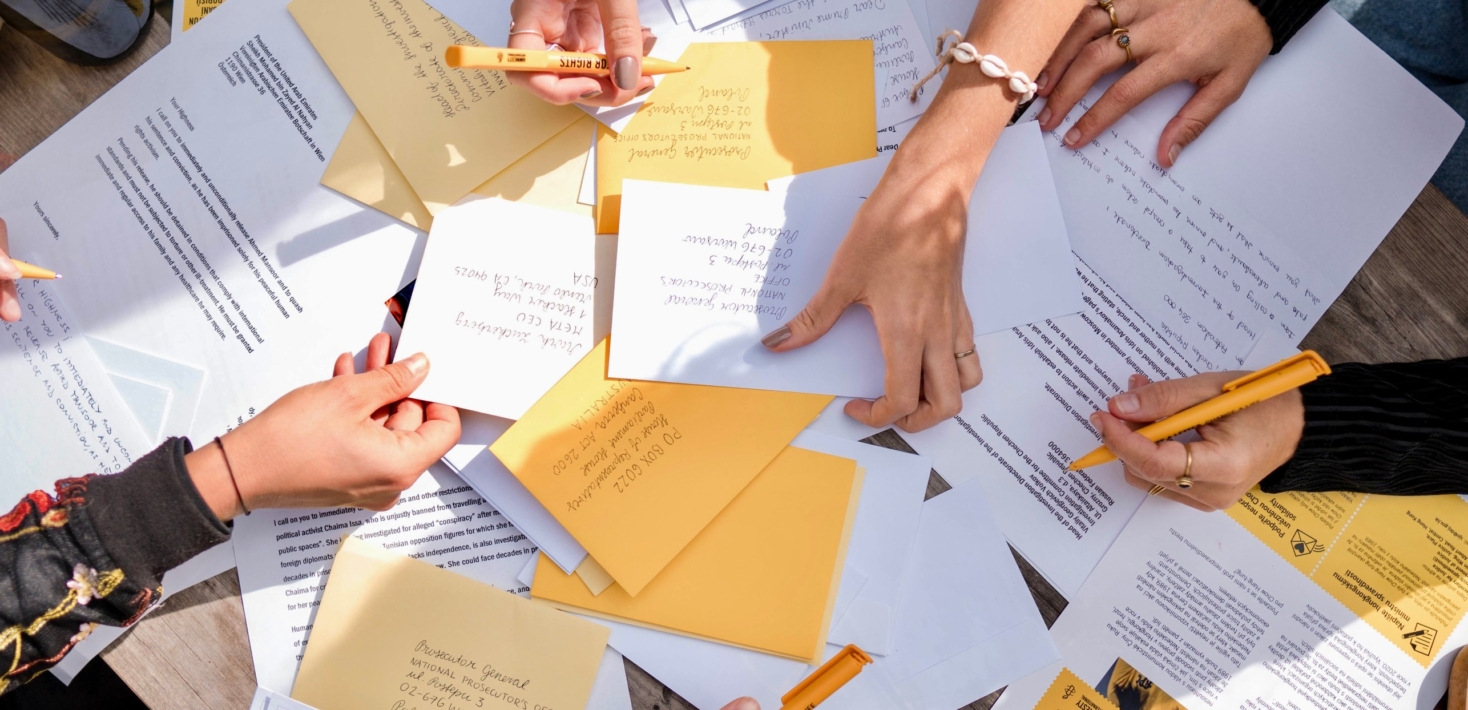 People sort through letters to mark Amnesty's annual campaign Write for Rights.