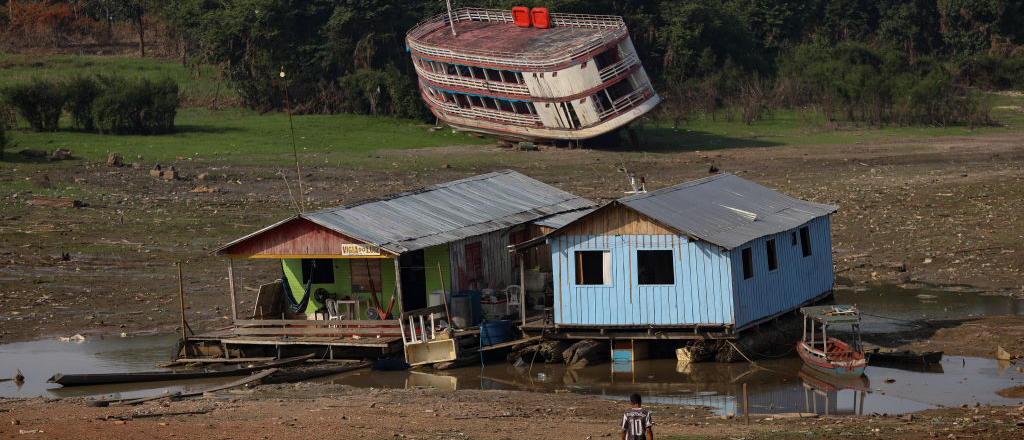 Houseboats and a stranded boat are seen on the Rio Negro, in the Cacau Pirera District, in Iranduba, Amazonas, Brazil, on September 25, 2023. The Government of Amazonas declared a State of Environmental Emergency on September 12 due to the high number of fires and a drought in the region.