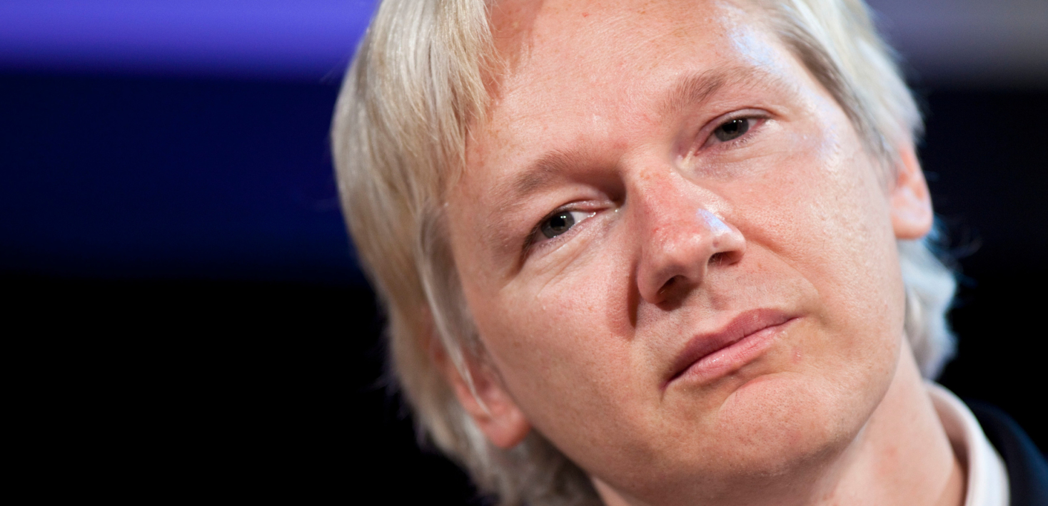 Julian Assange looking at camera.