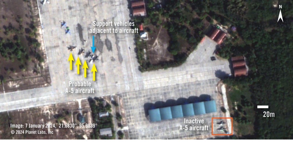 Satellite imagery showing the A-5 aircraft at the Tada-U military base. There are four aircraft with support vehicles nearby.