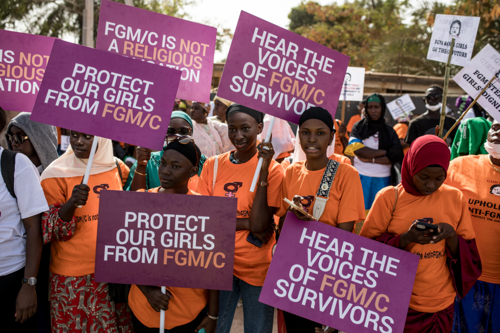 Anti Female Genital Mutilation protesters outside the National Assembly in Banjul, Gambia, on 18 March 2024