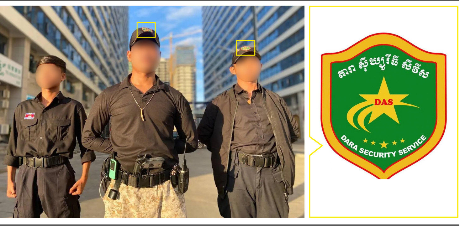 Three security guards standing in a compound. One of them has a holstered pistol in their belt, two wear hats with the DAS logo showing green background.