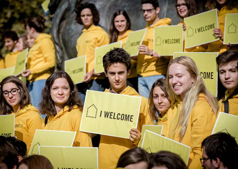 Activists from Amnesty France show that they welcome refugees, Place de la Republique, Paris, October 2016.