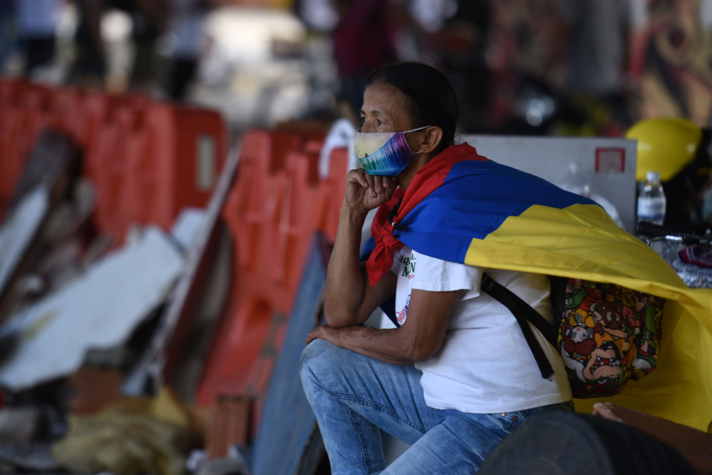 La recesión económica sin precedentes que sufrió Colombia en el 2020 a raíz de la pandemia y la falta de apoyo por parte del Gobierno a una población empobrecida han sido factores determinantes en la duración e intensidad de esta protesta. Foto: Christian Escobar Mora/Amnistía Internacional
