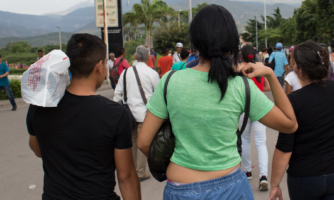 Venezuelan migrants at the border bridge "Simon Bolivar" in Colombia