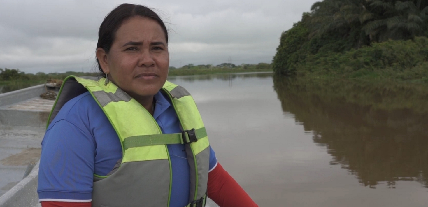 Yuly Andrea Velásquez Briceño aboard a boat in the Colombian wetlands