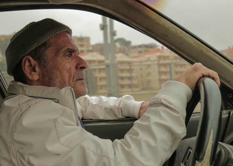 Abo Tareq, chauffeur de taxi.