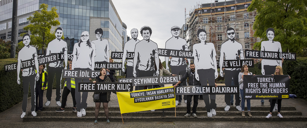 Protesters outside the European Commission building in Brussels July 2017 - Scores of activists holding banners and placards protest outside the European Commission building in Brussels -  to urgently raise the issue of jailed human rights defenders - including Amnesty International’s Turkey Director and Chair, Idil Eser and Taner Kılıç and nine other Turkish human rights defenders