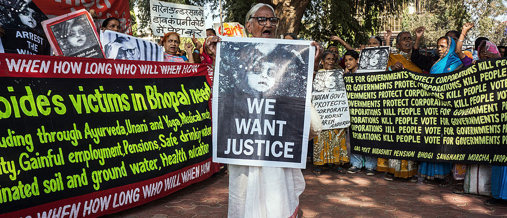 Women protest at a march demanding social justice and reparations for the victims of the Bhopal gas leak