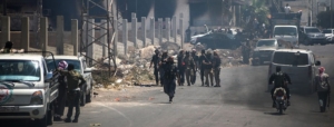 Tribal and bedouin fighters gather in the western neighbourhood of southern Syria's predominantly Druze city of Sweida, amid clashes with Druze gunmen on July 19, 2025.